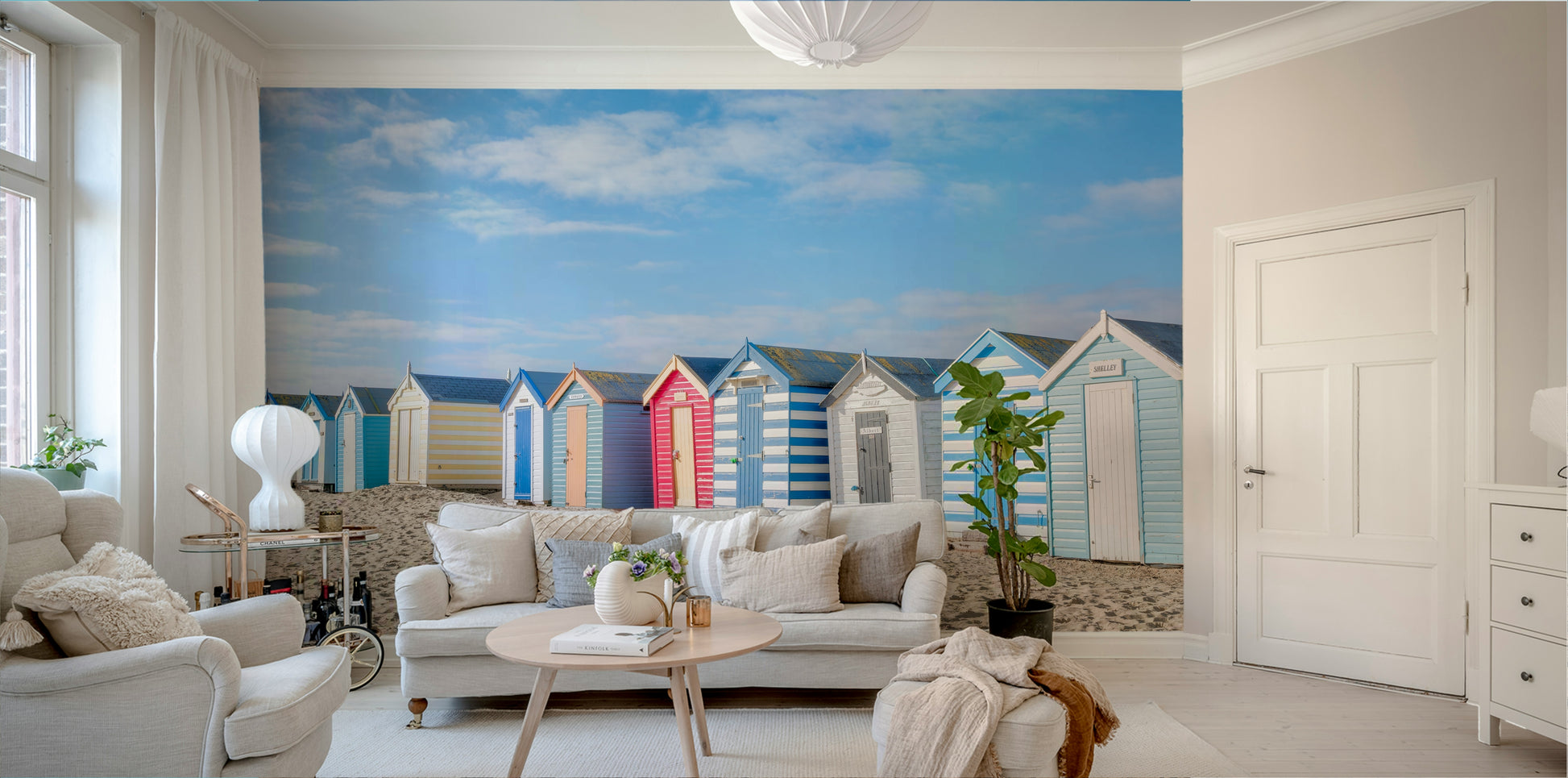A minimalist interior with the beach-themed wallpaper.

