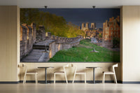 A high-angle view of the wall mural in a large space.

