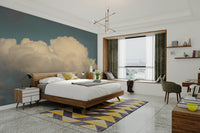 A minimalist interior with the cloud-themed wallpaper.

