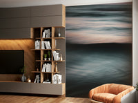 A bedroom with the wall mural behind the headboard.

