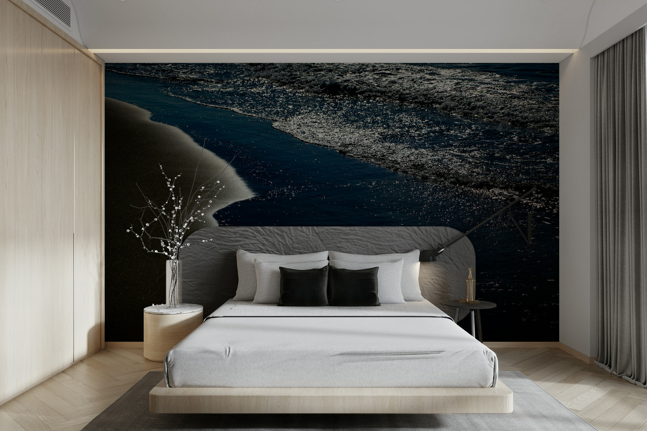 A beautiful coastal rock wallpaper mural with crashing waves.

