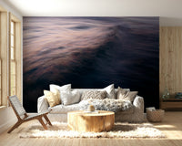 A peaceful open ocean mural on decorative wallpaper.

