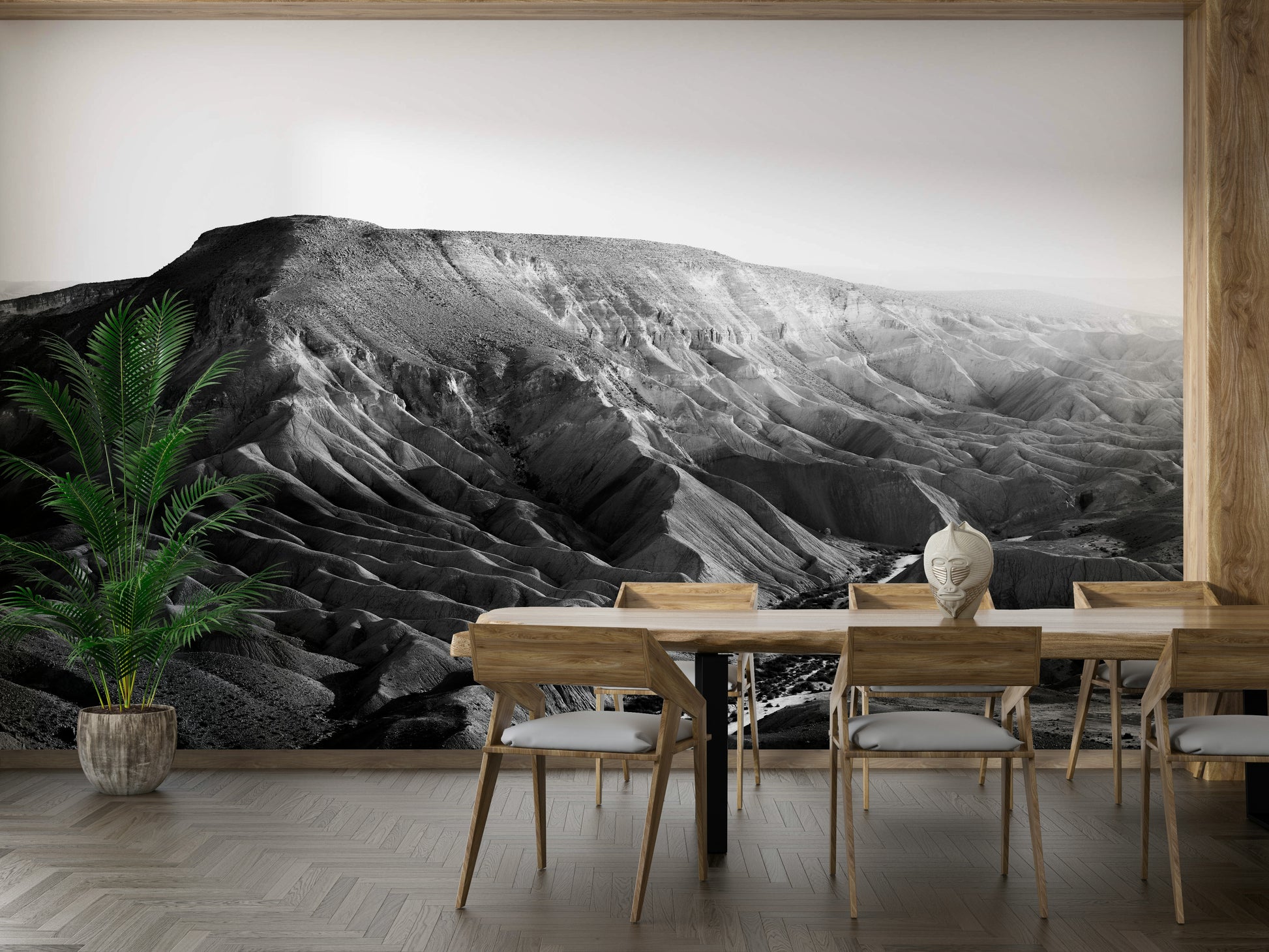 An artistic canyon view mural on minimalist wallpaper.

