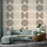 A graceful subtle circle wall mural in cool, neutral tones.

