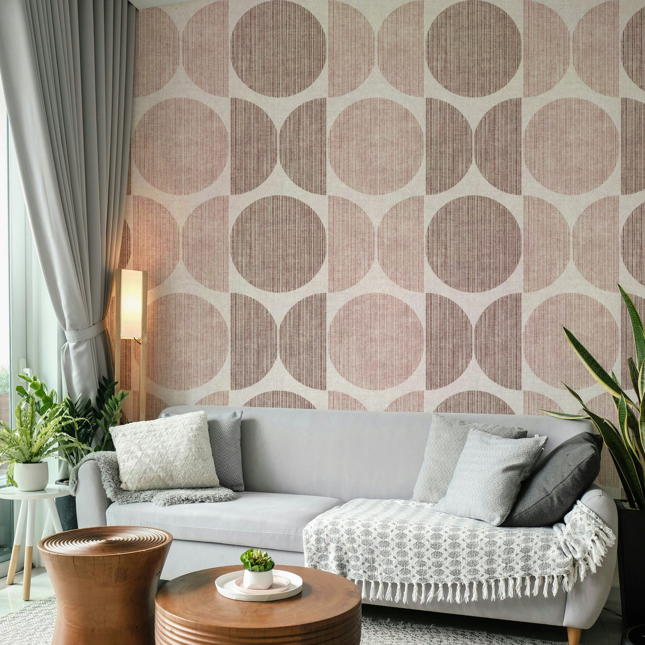 A beautiful pink geometric wallpaper mural with playful circles.



