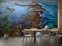 An artistic sandy shore mural on minimalist wallpaper.

