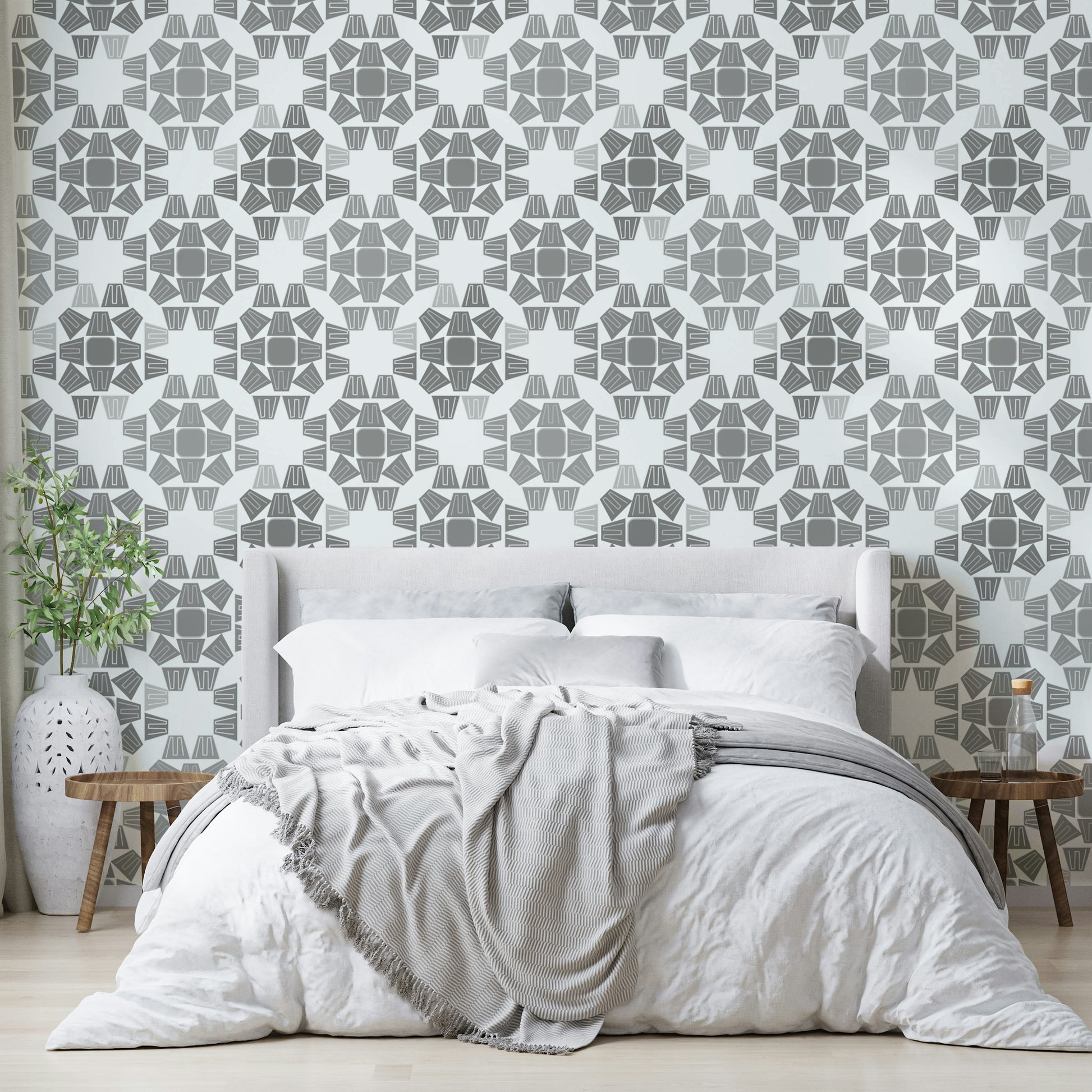 A graceful subtle geometric wall mural in cool, gray tones.

