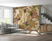 A peaceful flower and bird mural on decorative wallpaper.

