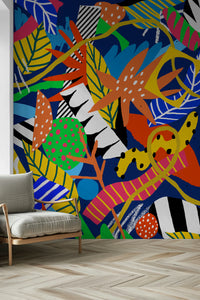 An artistic jungle foliage mural on minimalist wallpaper.

