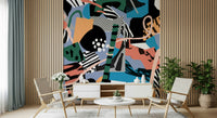 An artistic abstract shape mural on elegant wallpaper.

