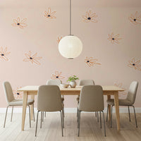 An artistic delicate bloom mural on minimalist wallpaper.