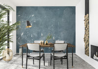 A beautiful abstract blue plaster wallpaper mural with a subtle, distressed texture.
