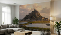 Mont Saint-Michel Dawn Wall Mural featuring the iconic island and abbey at sunrise.