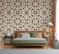 Triangles wallpaper in warm golden hues creating a cozy and elegant accent wall.