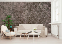 Textured wall mural with grunge-inspired patterns creating a bold, industrial-style accent wall.