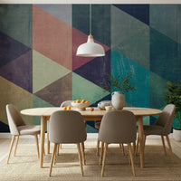 Wall mural showcasing retro triangle shapes in layered colors for contemporary or vintage décor.