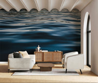 Wall mural with layered deep blue textures mimicking ocean waves for a serene, contemporary décor.