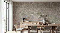 Textured wall mural with mosaic stone patterns creating a rustic and artistic accent wall.