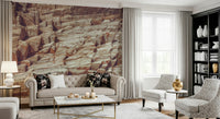 Artistic wall mural of a textured rock wall in neutral tones