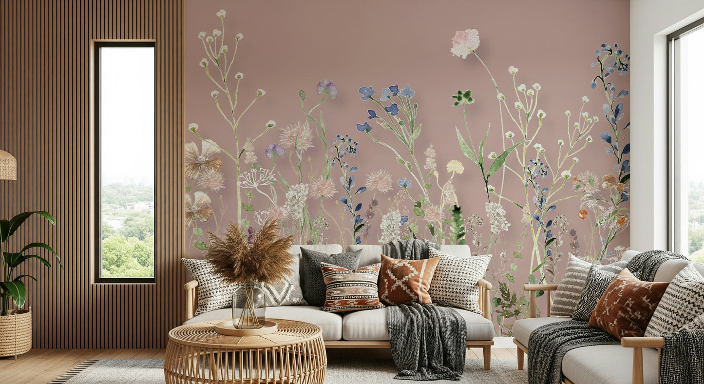 A pastel pink wallpaper with tall wildflowers rising in gentle, hand-painted detail.