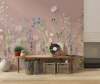 A nature-inspired wallpaper decorated with soft green stems and pastel blossoms on a pink base.