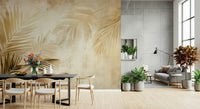 A luxury tropical wallpaper featuring golden palm silhouettes fading into an earthy wash.