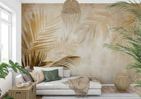 A luxurious wallpaper with golden palm fronds brushed across a faded, artistic background.