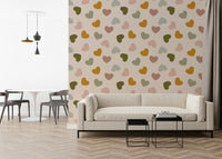 A gentle heart-pattern wallpaper with mixed textured and solid hearts in warm, muted colors.