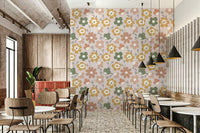 A cheerful boho wallpaper with large stylized flowers and delicate line-drawn stems.