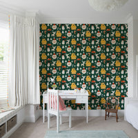 A fun festive wallpaper with bright red, white, and yellow Christmas illustrations on a green backdrop.