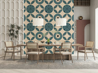 A teal geometric wallpaper with radial circles and symmetrical leaf shapes arranged in rows.