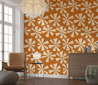 Chic retro wallpaper with scattered cream flower bursts in a bold geometric design.