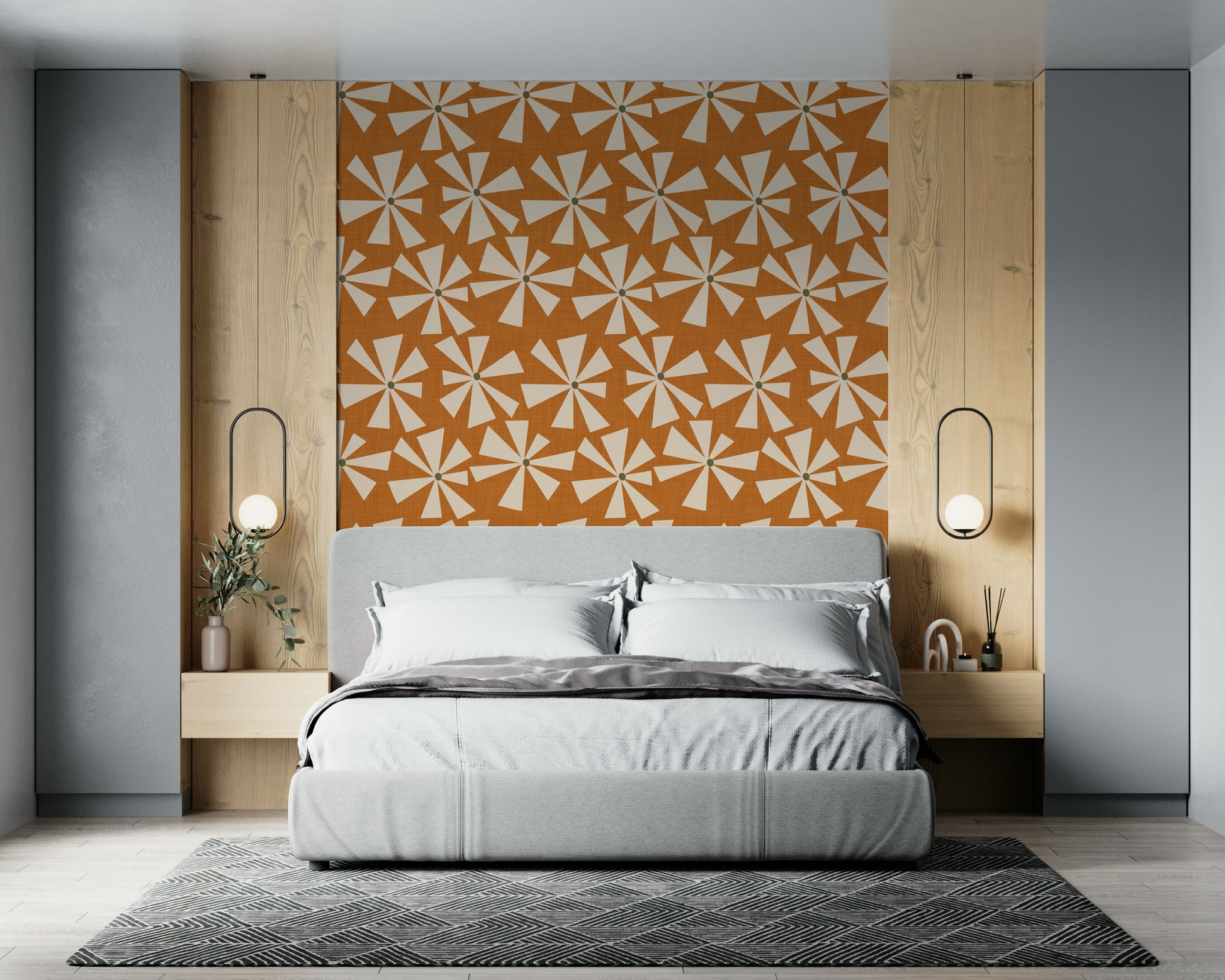 Retro-style wallpaper with bold pinwheel flower motifs in warm earthy tones.
