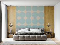 Minimalist geometric design featuring textured aqua orbs on a smooth light beige base