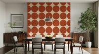 Warm neutral wallpaper featuring oversized terracotta round shapes arranged in rows and columns