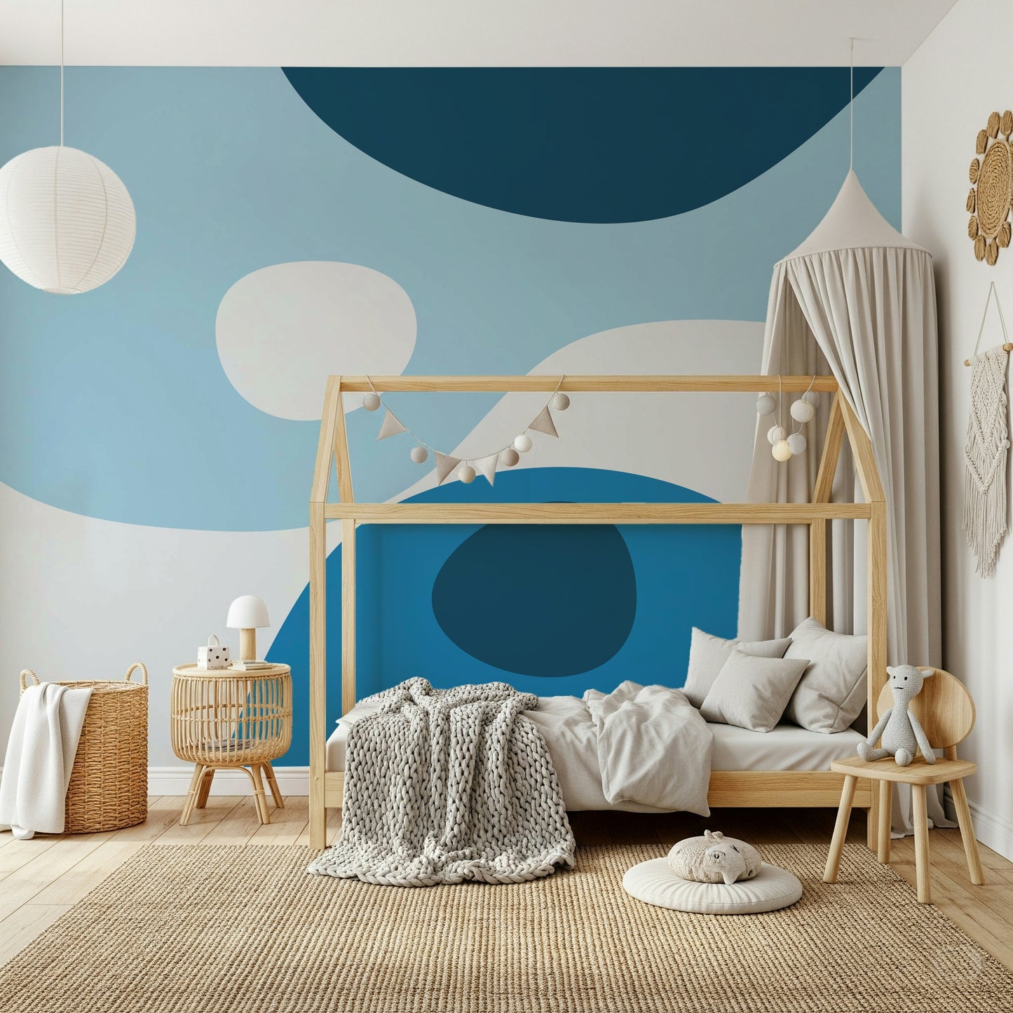 A contemporary wallpaper showcasing fluid blue forms and minimalist abstract design.