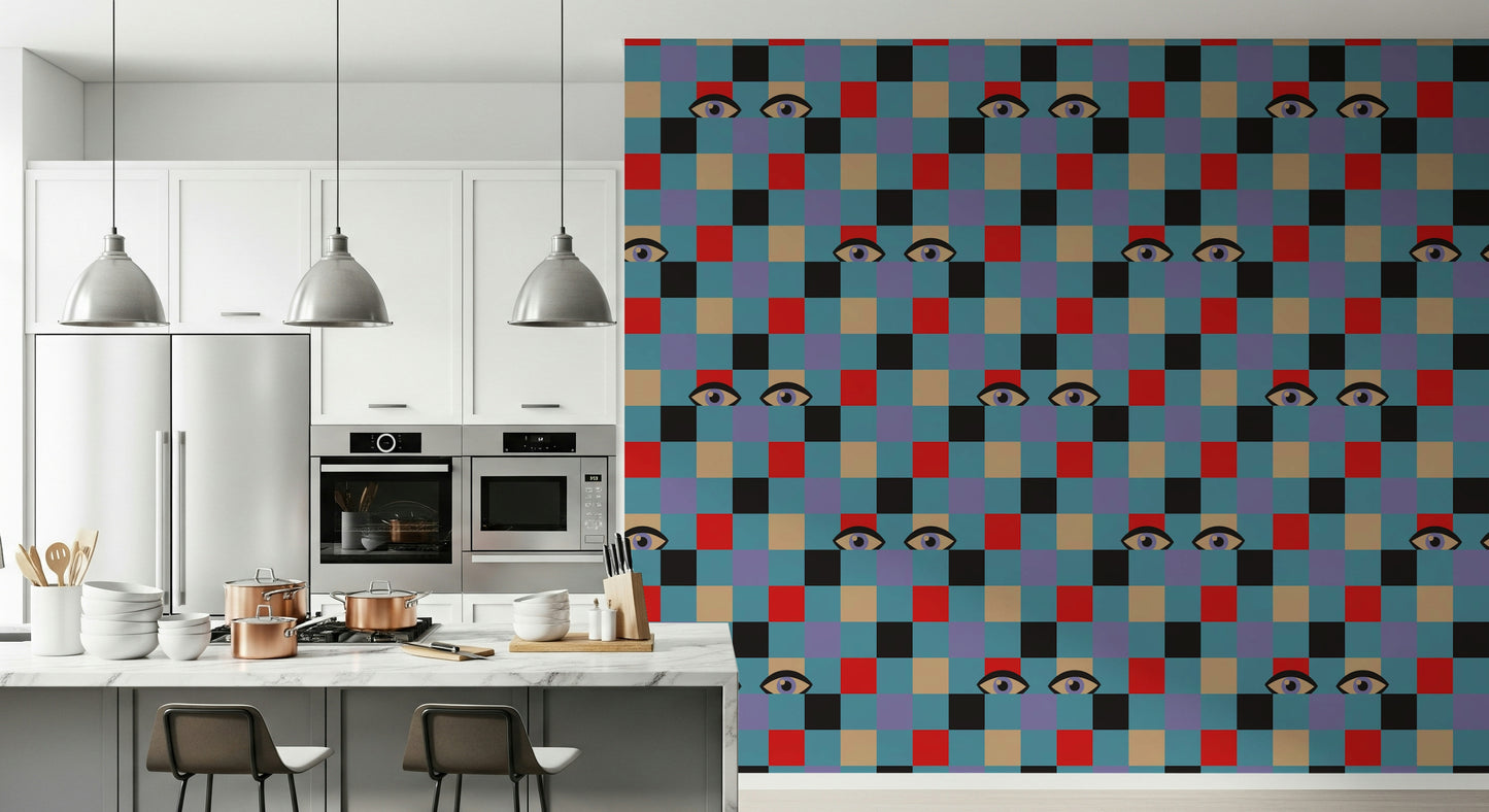 A bold retro wallpaper displaying multicolored squares with whimsical eyes appearing throughout the pattern.