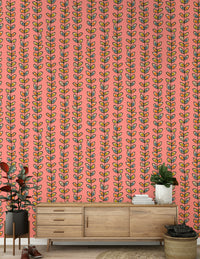 A pink retro leaves wallpaper featuring vertical climbing vines with colorful hand-drawn leaves.