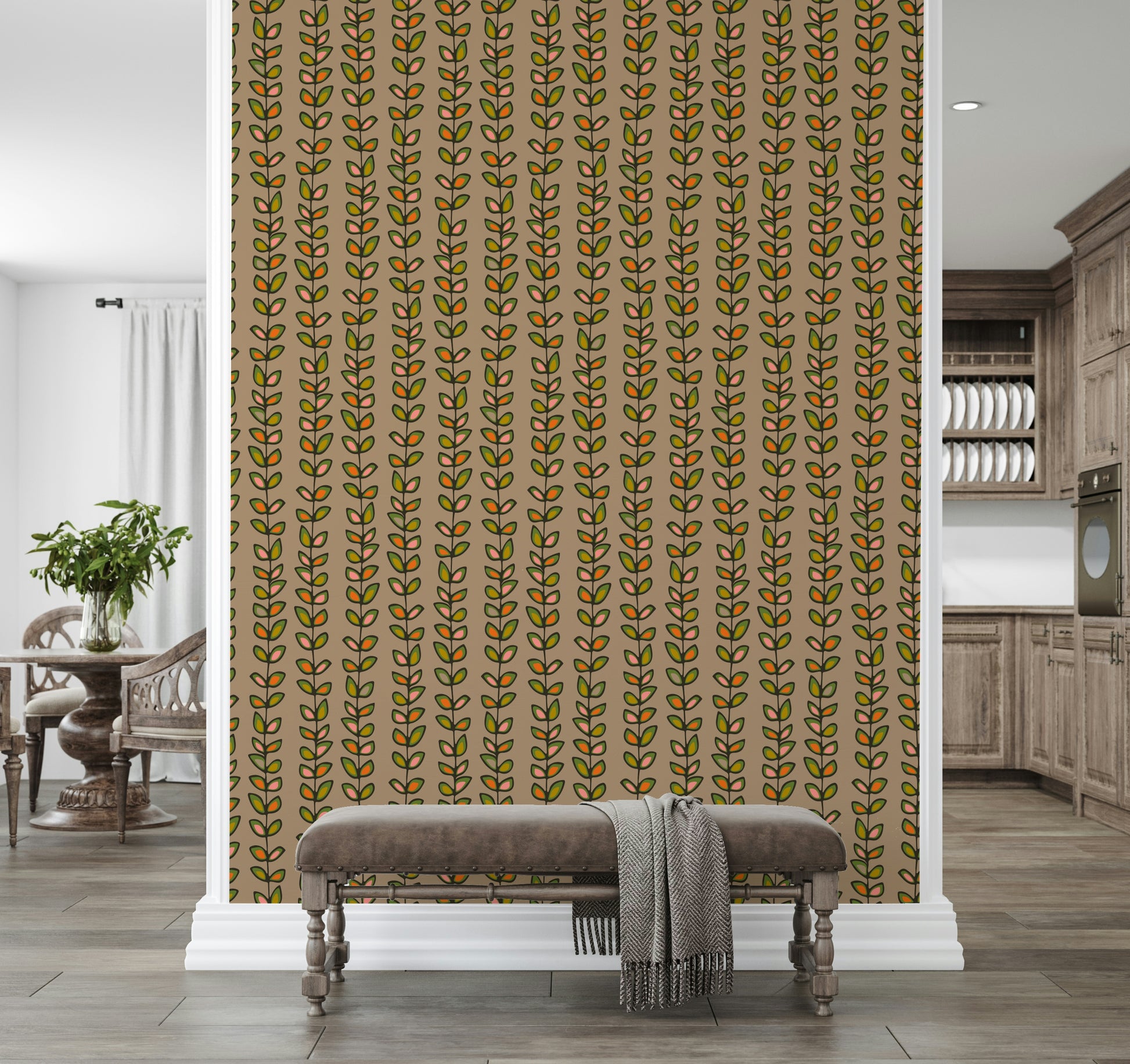 Colorful leaf motifs in orange and green forming playful vertical vine stripes on a beige wallpaper.