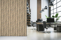 A cream wallpaper decorated with repeating vertical vines and bold outlined retro-style leaves.