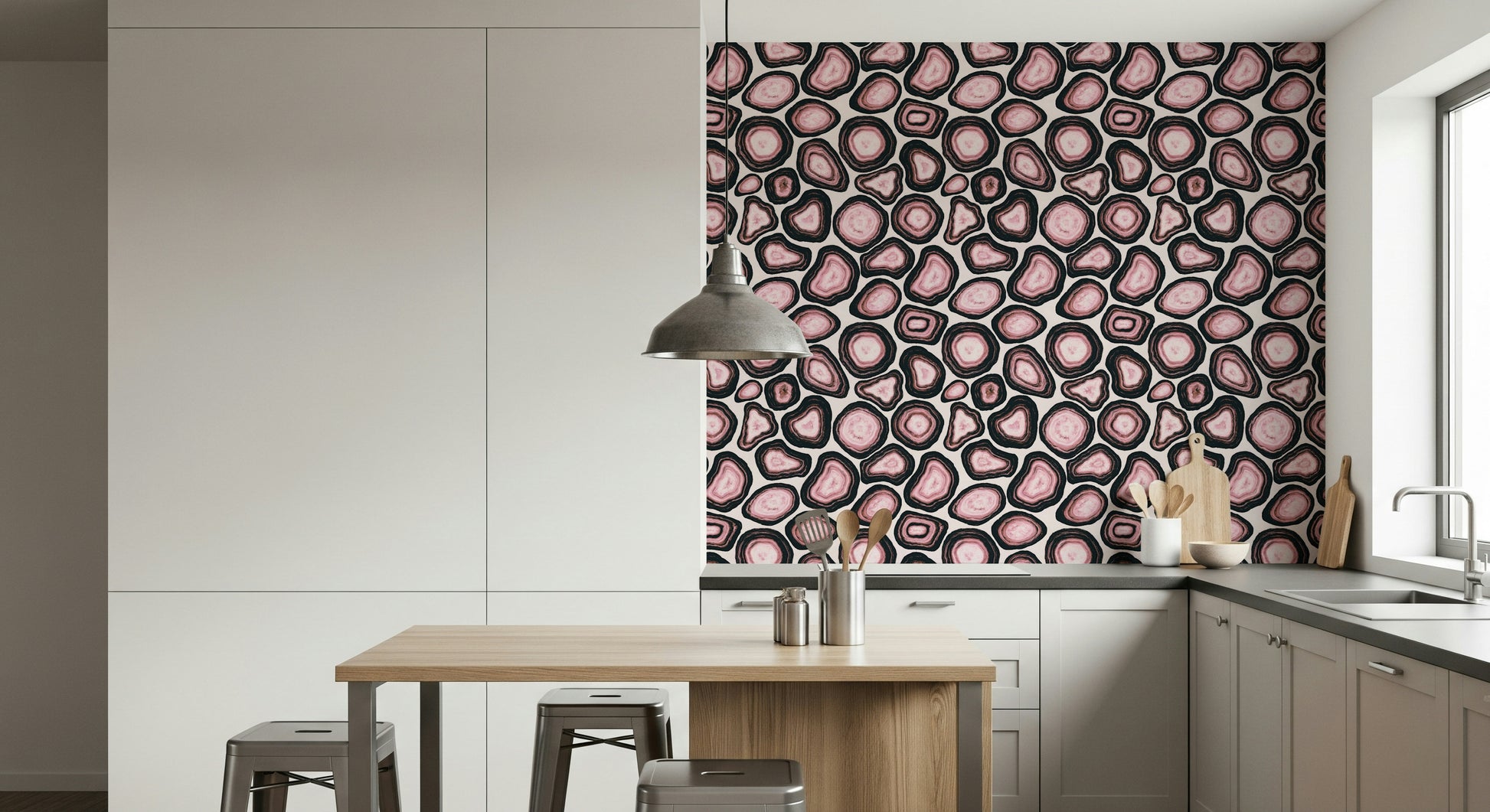 Pink mineral clusters arranged in an intricate agate-pattern wallpaper.