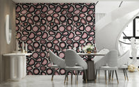 A gemstone wallpaper showcasing swirling pink agate slices with textured layers.