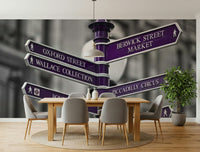 A modern wallpaper displaying multiple London direction signs with purple accents for a stylish city vibe.