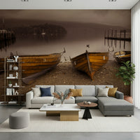 Decorative wallpaper depicting rustic rowboats anchored on a sepia-toned lakeshore.