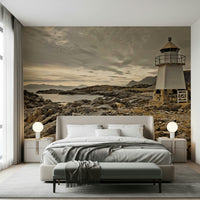 Nature wall mural depicting a lighthouse guarding a windswept rocky shoreline at dusk.