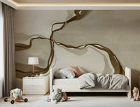 Artistic wall covering with gentle tan strokes and ink spill effect.