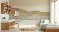 Soft watercolor mountain range mural showing beige and grey hues.