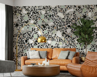 Contemporary speckled surface wall mural grey black mint flecks.