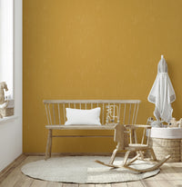 Contemporary textured wallcovering with a distressed retro mustard finish.