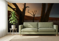 Stark Arid Woodland Ghost tree trunks wall mural, intense desert ambiance.